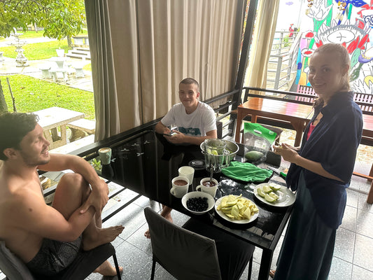 Ruslan Kumakhov, Diana and Timur preparing a raw food breakfast on Phuket